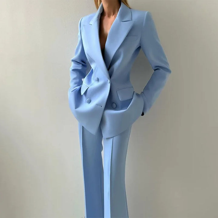 Close up of light blue double breasted blazer with flap pockets