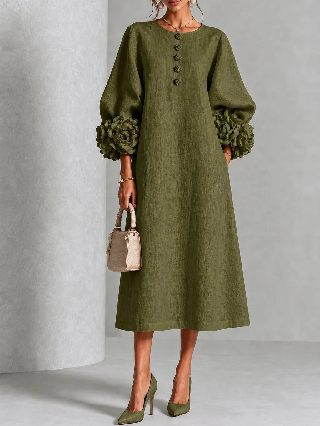 Woman wearing army green midi dress with 3D floral lantern sleeve cuffs