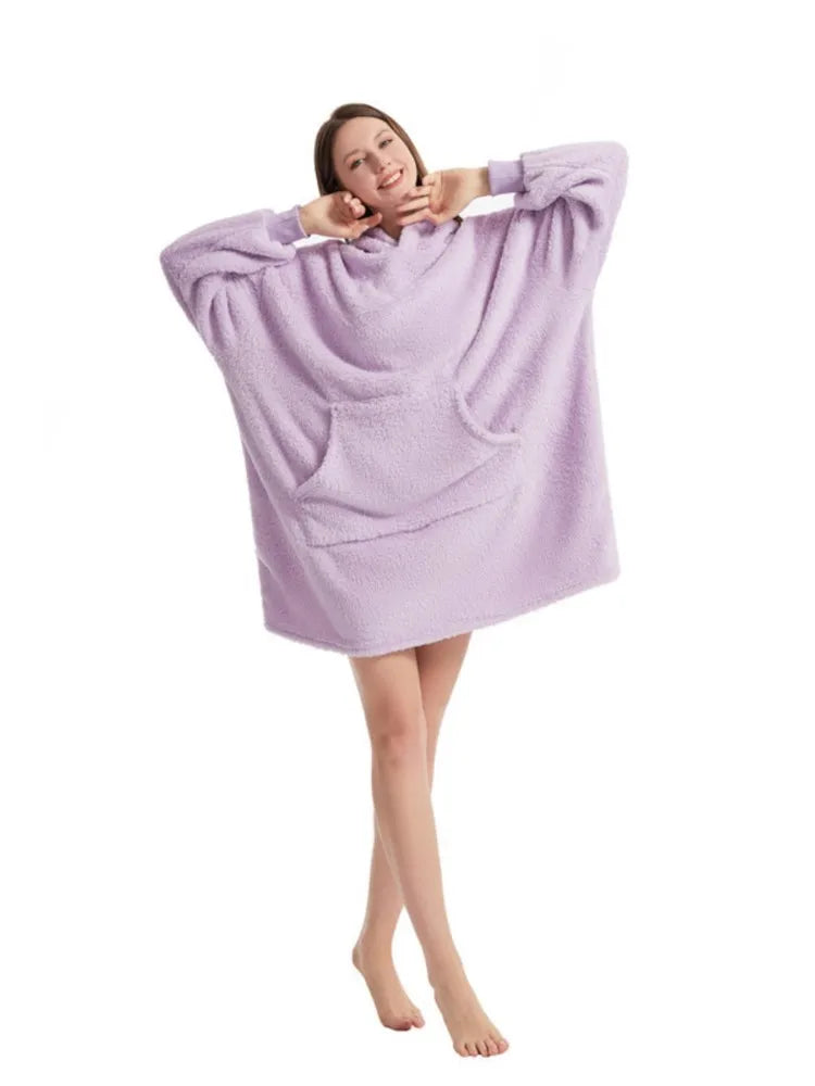 Woman wearing light purple oversized hooded blanket sweatshirt
