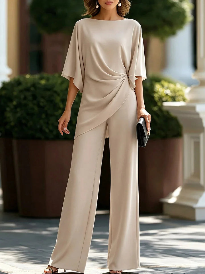 Beige two piece set with batwing sleeve top and wide leg pants, front view