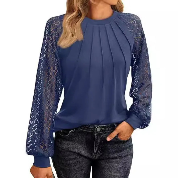 Blue pullover blouse with pintuck pleats and lace sleeves, front view
