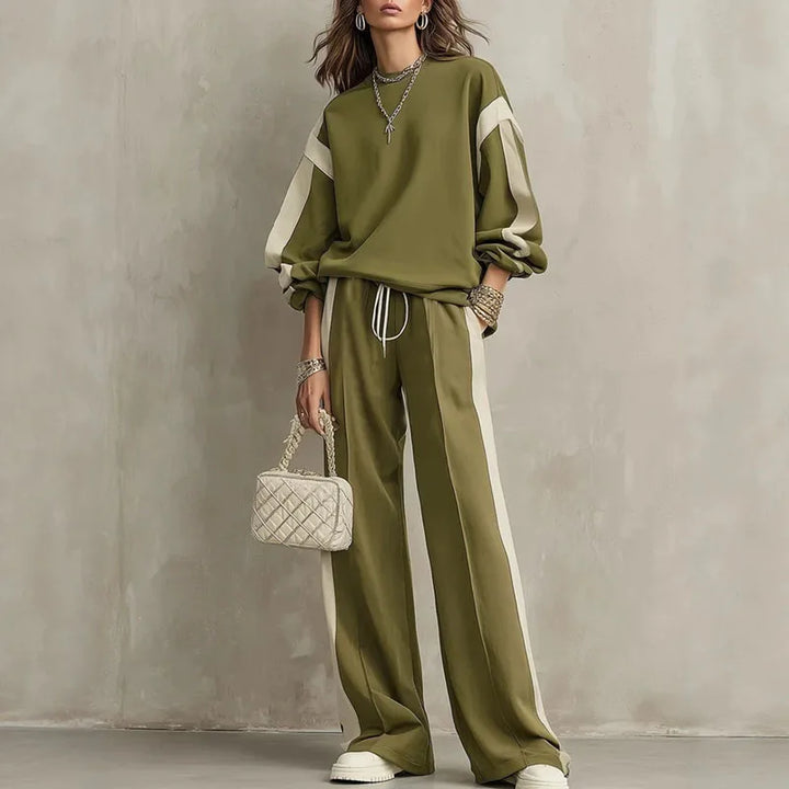 Woman wearing olive green color block sweatshirt and wide leg pants set, front view