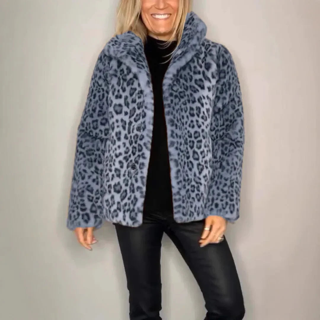 Model wearing gray leopard print faux fur coat