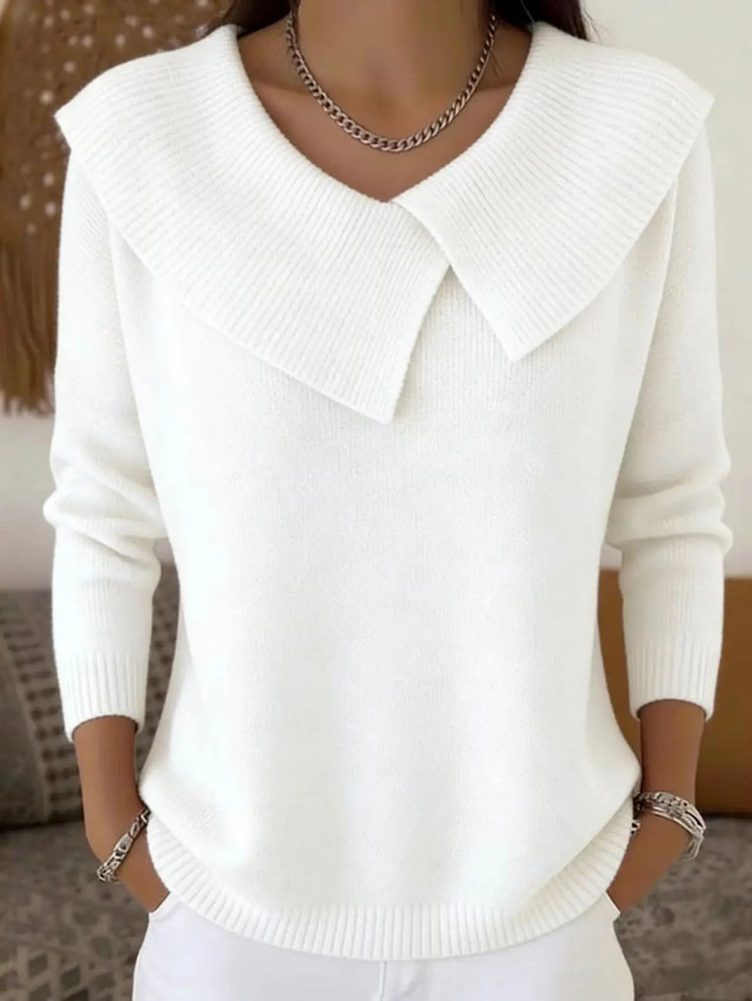 White sweater with oversized draped collar, front view