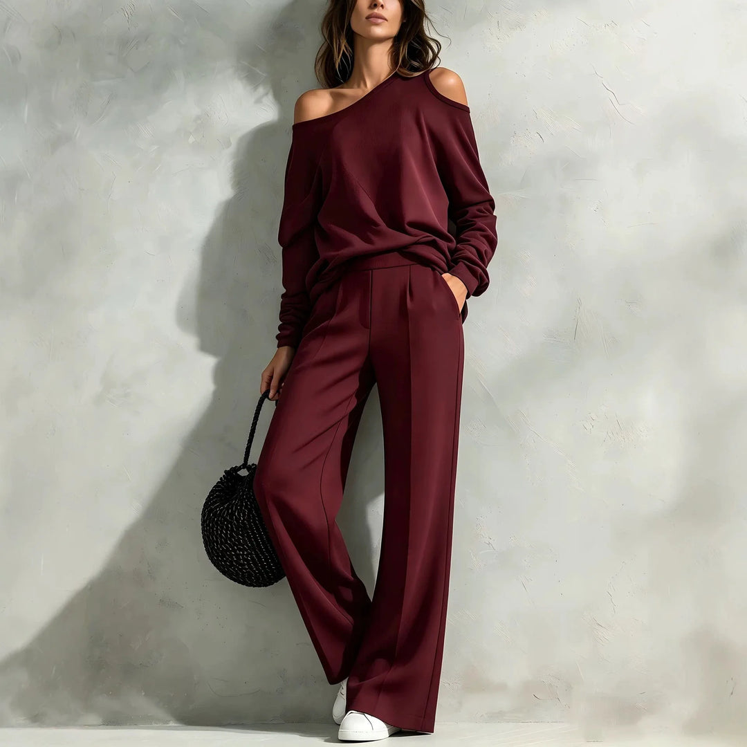 Woman wearing burgundy off shoulder top and wide leg pants set