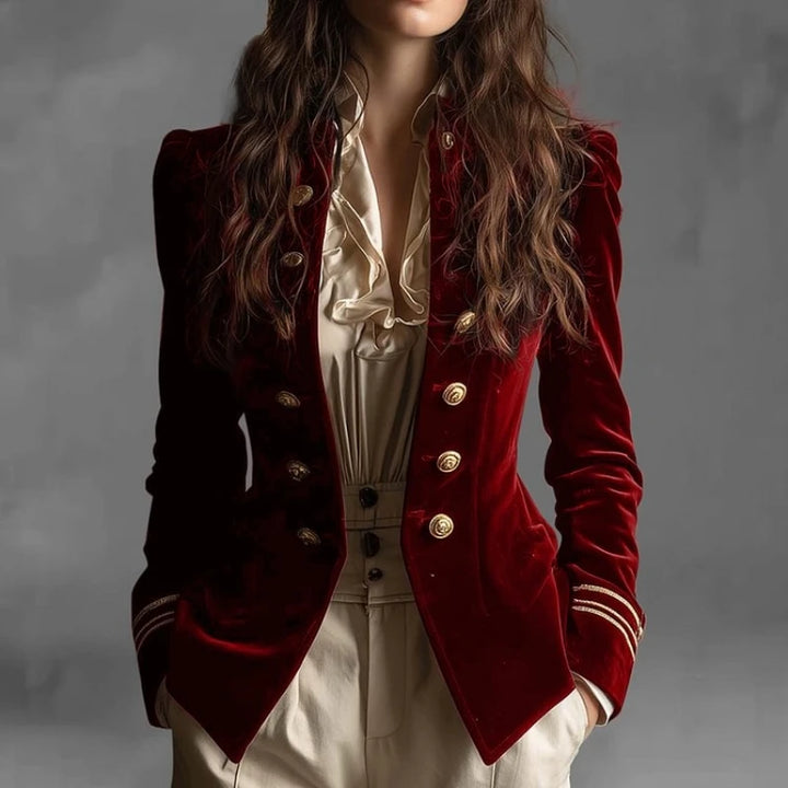 Front view of burgundy velvet military style blazer with gold buttons