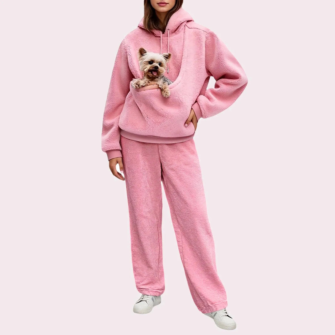 Pink fleece pet pocket hoodie and jogger set with dog in pocket