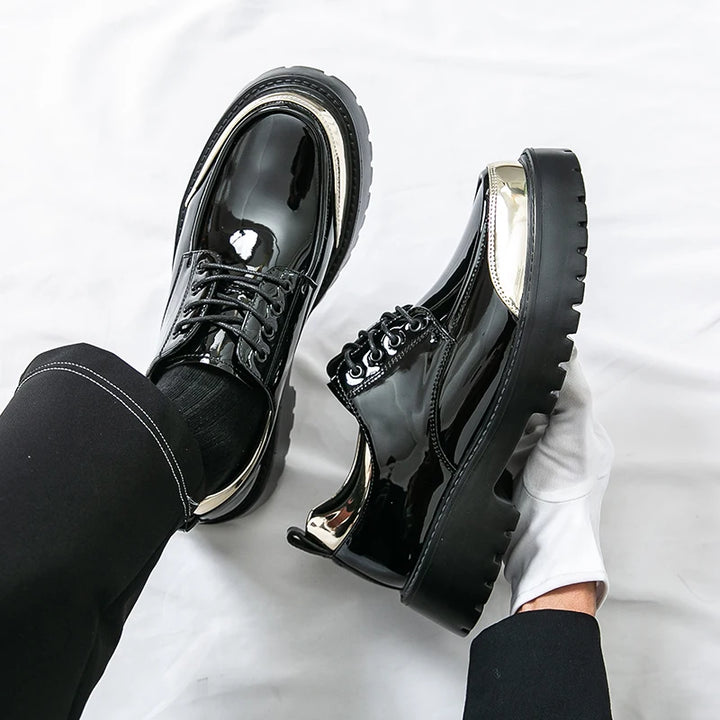 Black patent Oxford shoes overhead view with metallic toe