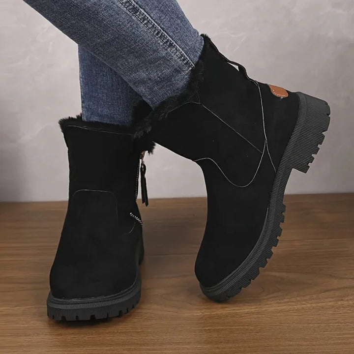 Black suede snow boots with faux fur collar detail