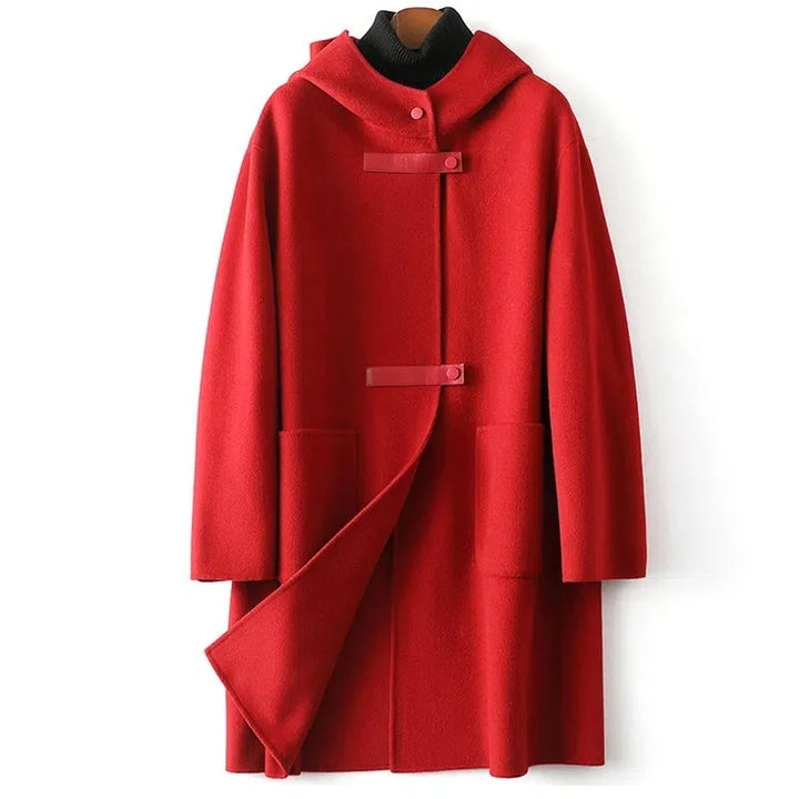 Red hooded wool coat with leather tab closures, front view