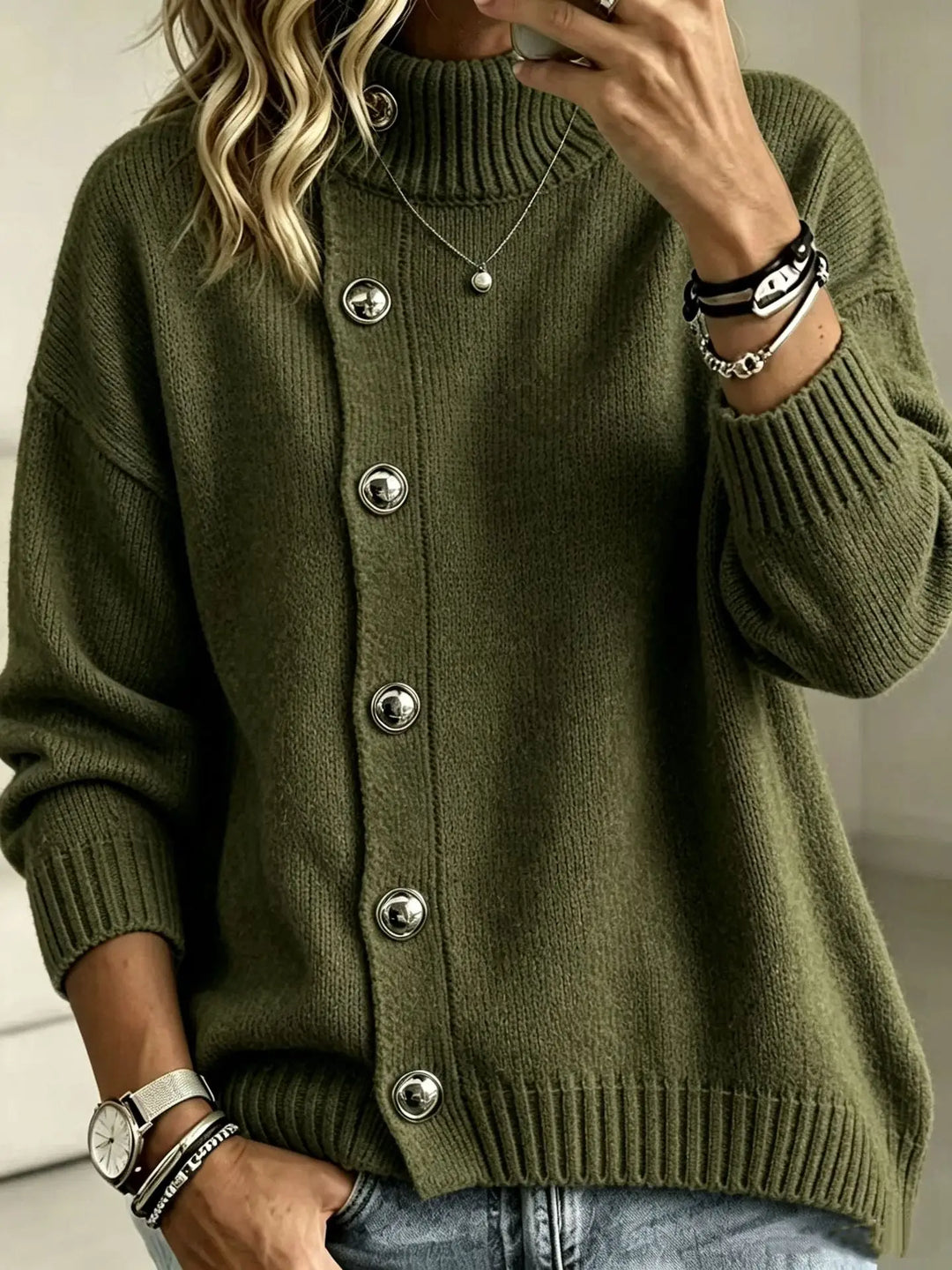 Woman wearing army green button front mock turtleneck sweater