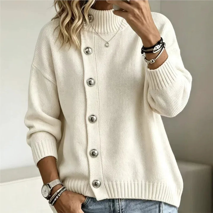 Woman wearing milky white button front mock turtleneck sweater