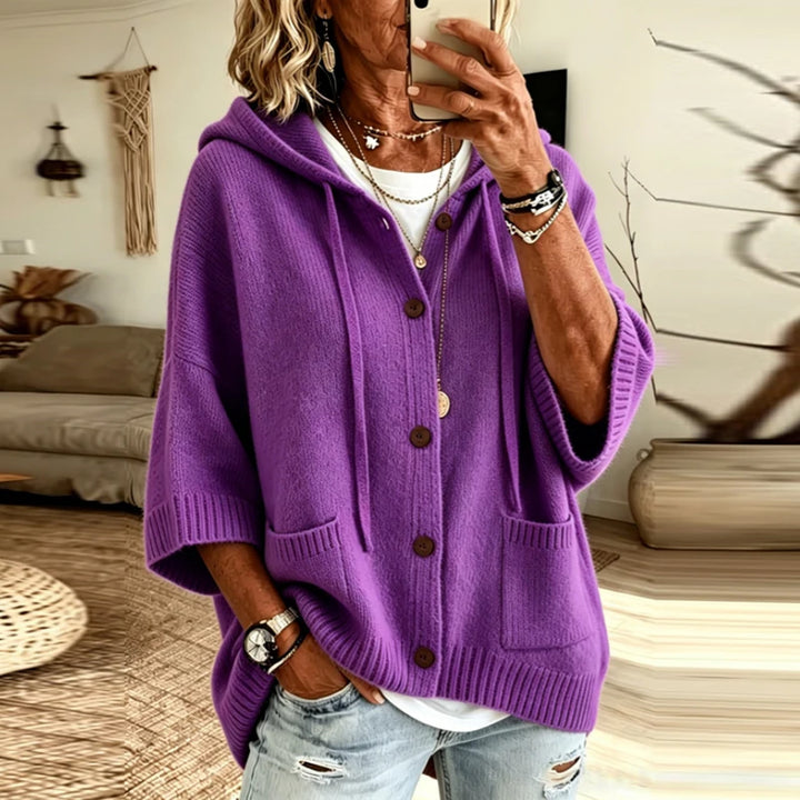 Woman wearing purple hooded button-front knit cardigan