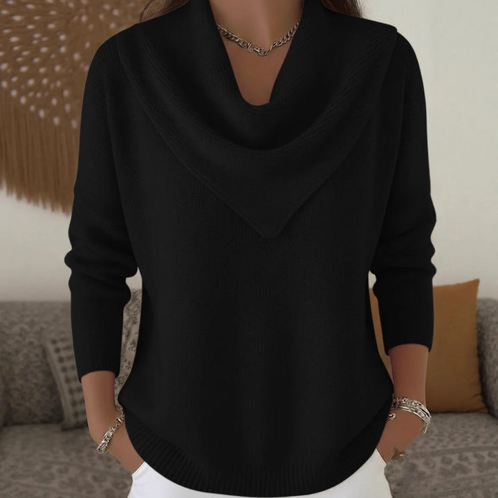 Woman wearing black cowl neck ribbed knit sweater