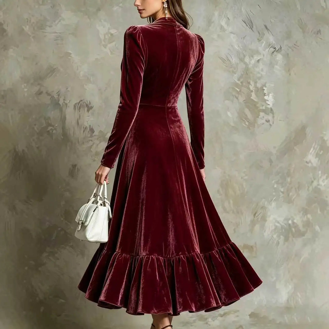 Back view of burgundy velvet midi dress with ruffled hem