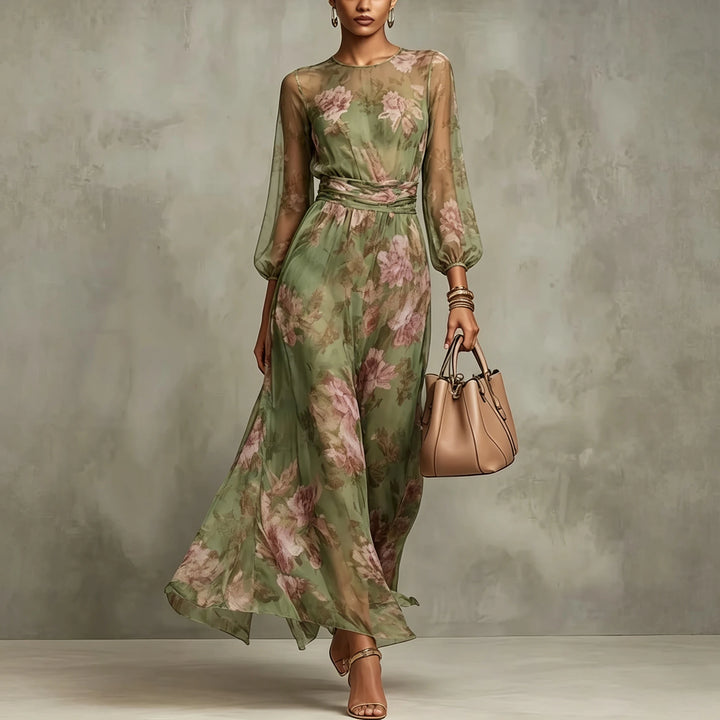 Woman walking in green floral print maxi dress with lantern sleeves and handbag