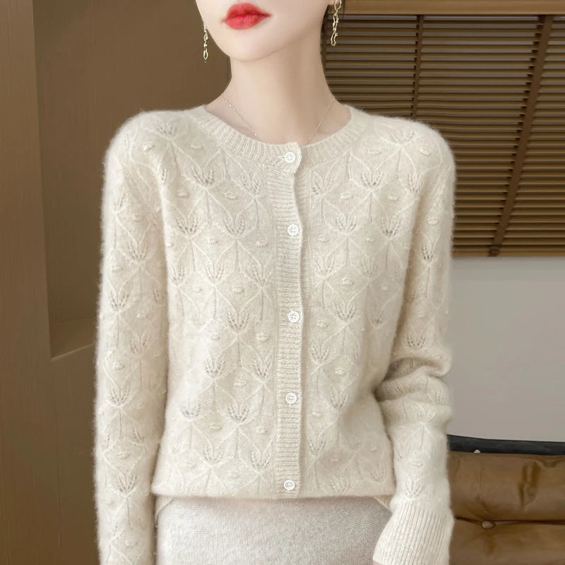 Close up of white jacquard cardigan button front detail