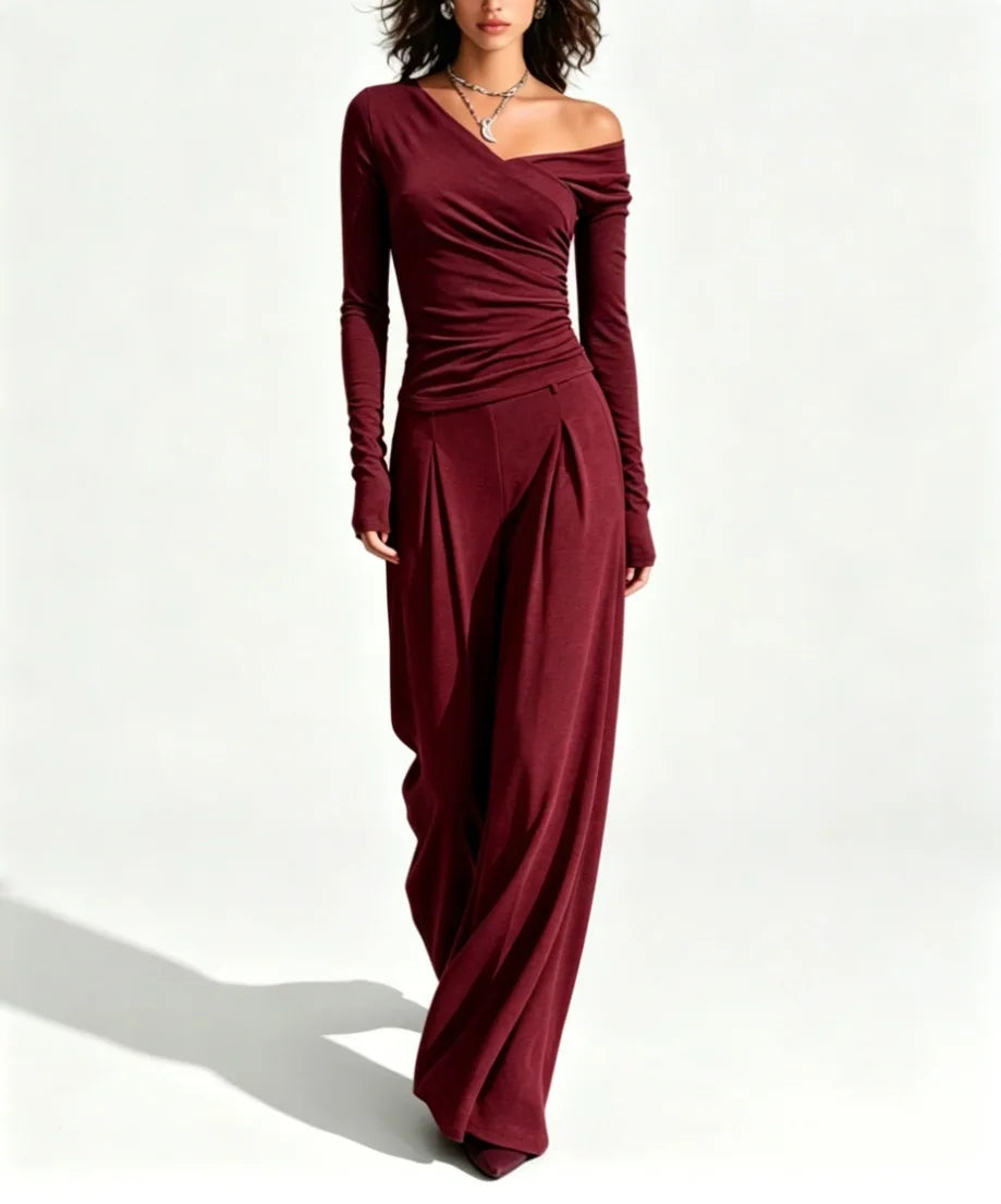 Woman wearing claret off shoulder top and wide leg pant set