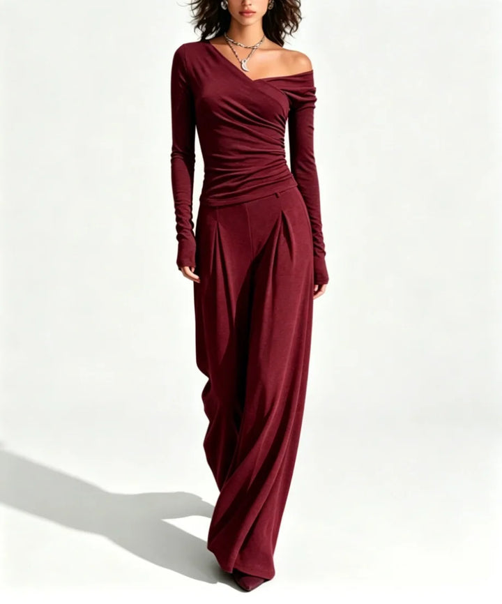 Woman wearing claret off shoulder top and wide leg pant set