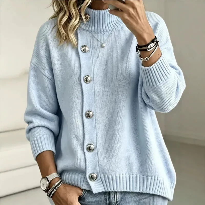Woman wearing sky blue button front mock turtleneck sweater