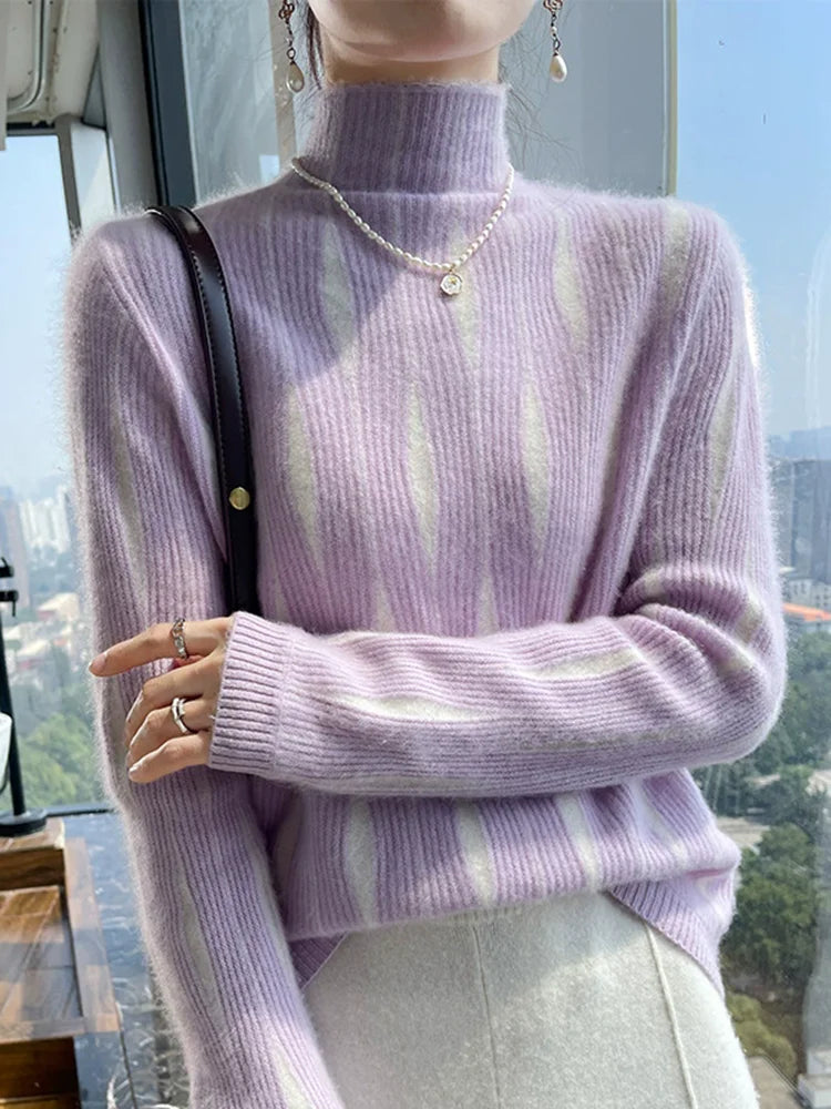 Purple striped sweater on model with shoulder bag