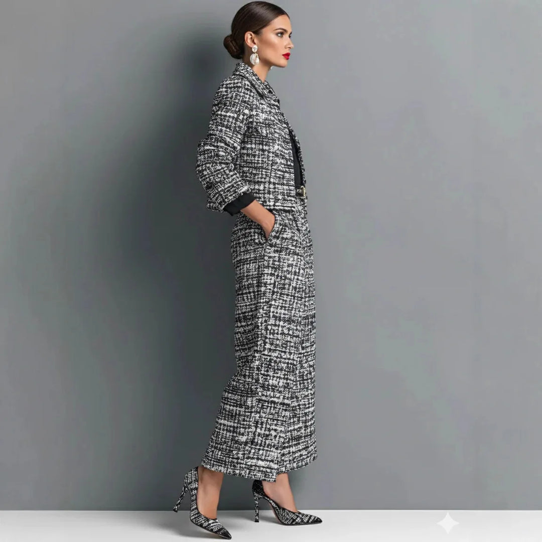 Side view of black and white tweed jacket and wide leg pants set