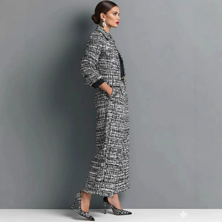 Side view of black and white tweed jacket and wide leg pants set
