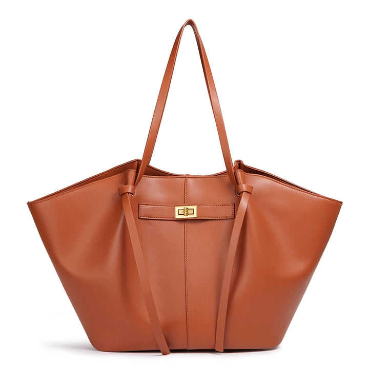 Light brown leather winged tote bag front view