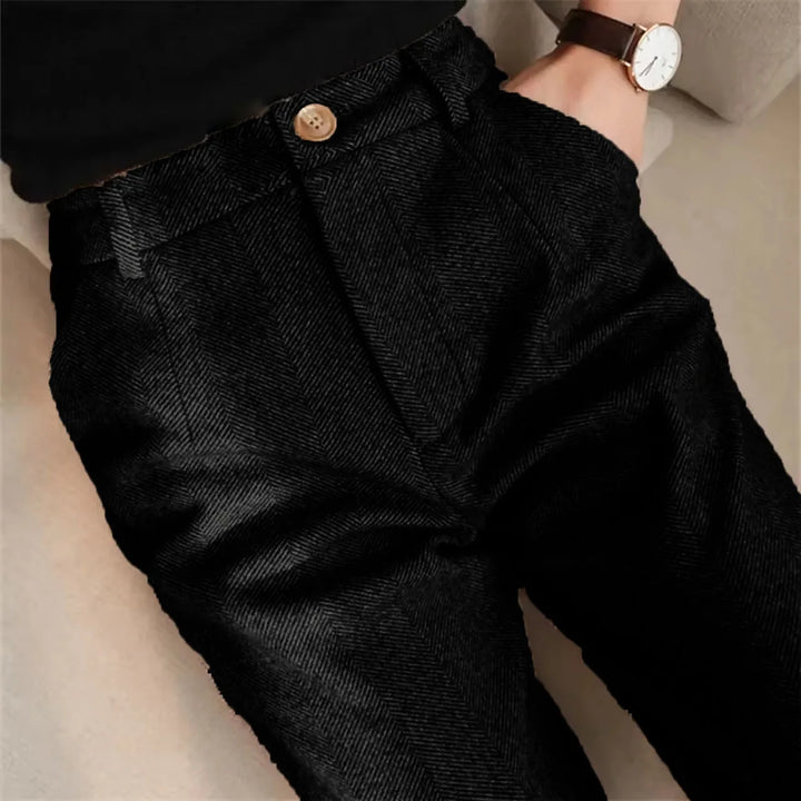 Herringbone trousers in black with button front waistband