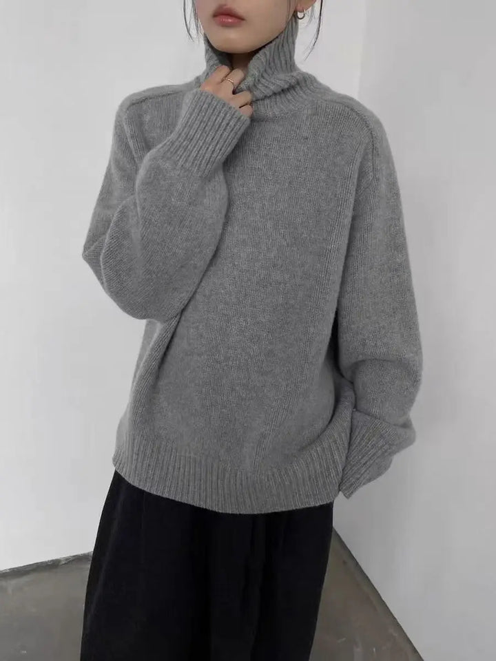 Close up of light gray turtleneck sweater collar