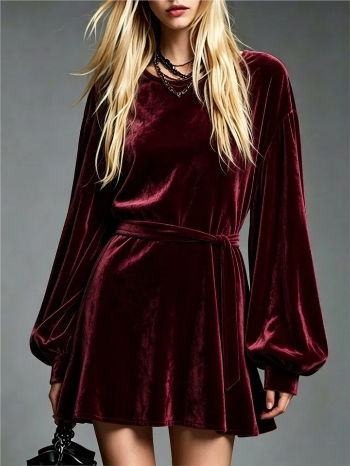 Burgundy velvet mini dress with lantern sleeves and tie belt, front view