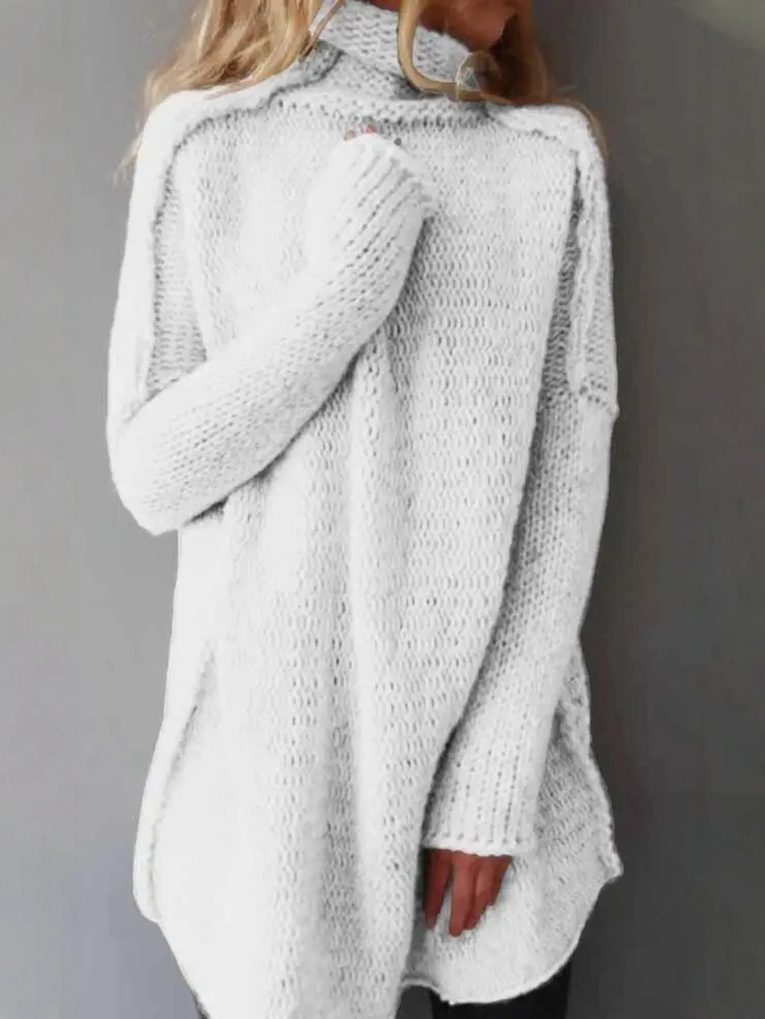 White turtleneck sweater back view on model