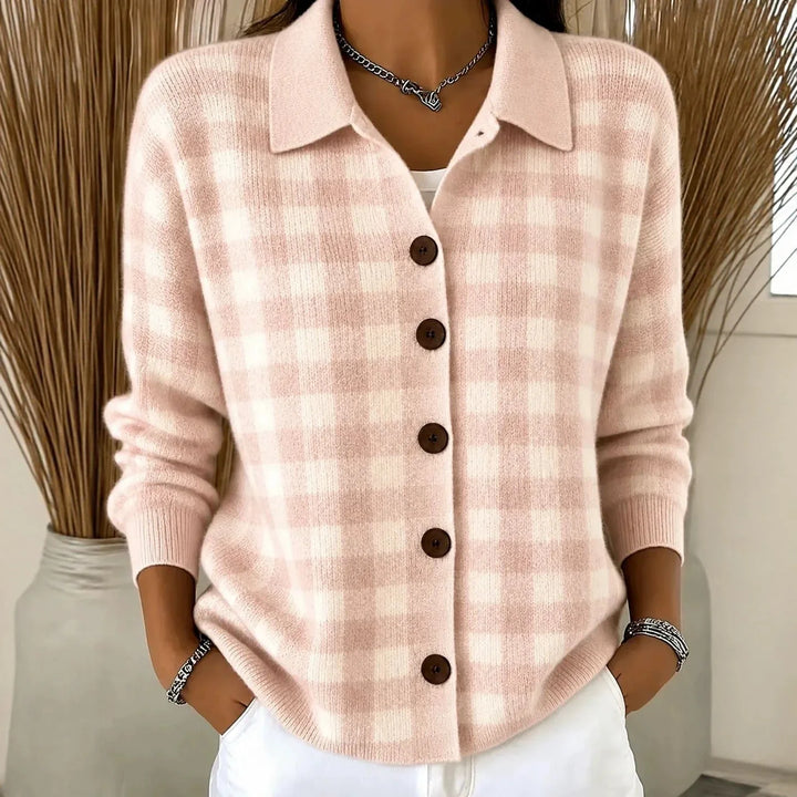 Woman wearing pink plaid knit button-front cardigan with point collar