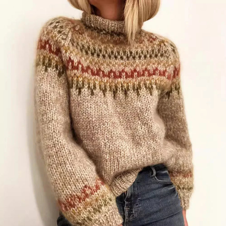 Woman wearing khaki fair isle turtleneck sweater with colorful yoke