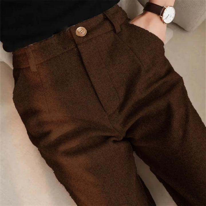 Herringbone trousers in brown with high waist button closure