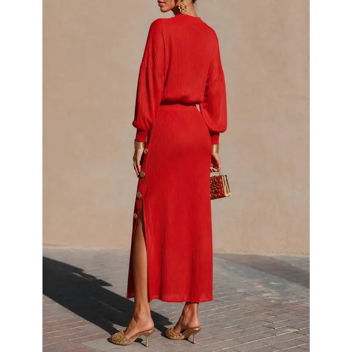 Red ribbed sweater dress with button side slit, back view