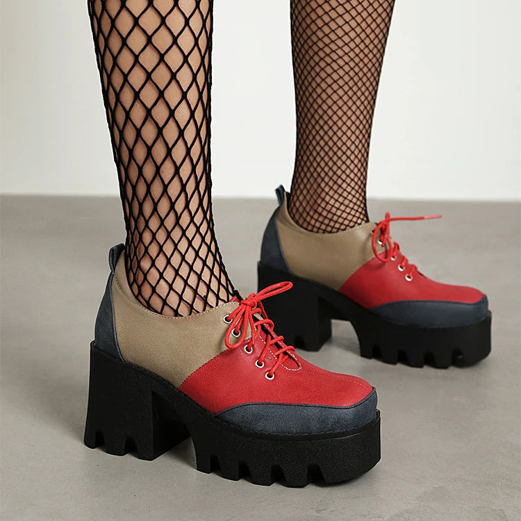Red and taupe color block platform shoe with fishnet tights