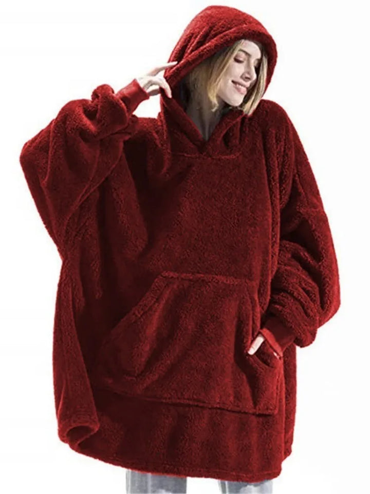 Woman wearing burgundy oversized hooded blanket sweatshirt