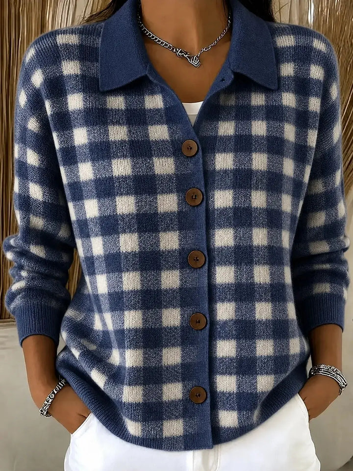 Woman wearing blue plaid knit button-front cardigan with point collar, close view