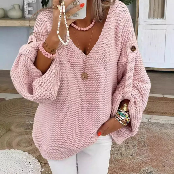 Pink chunky knit V-neck sweater with lantern sleeves