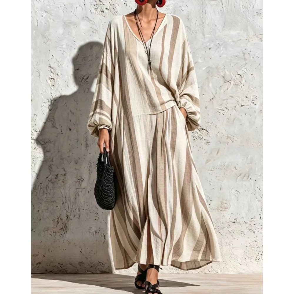 Woman wearing beige striped V-neck top and wide leg pants set