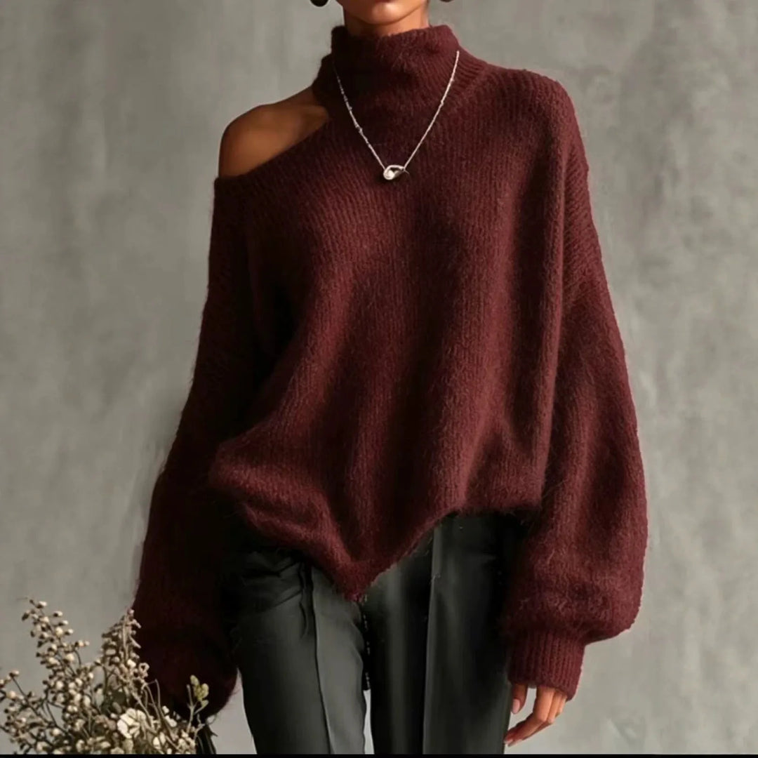 Woman wearing wine red cutout shoulder turtleneck sweater