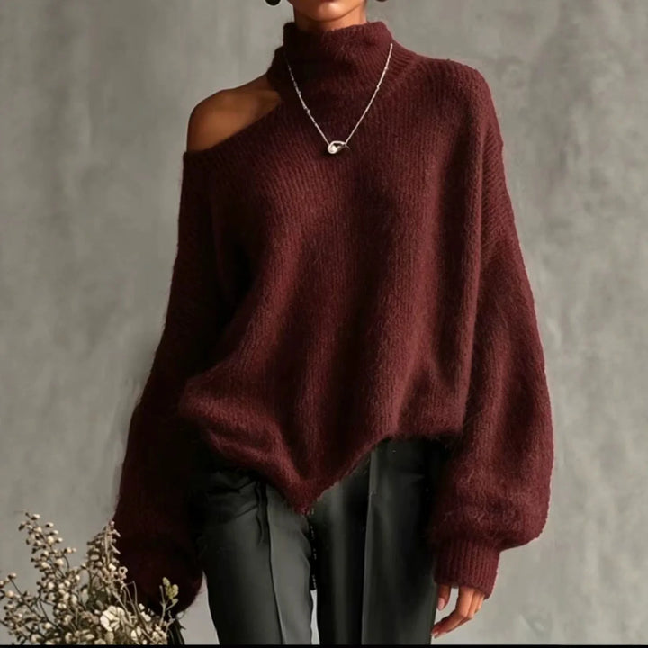 Woman wearing wine red cutout shoulder turtleneck sweater