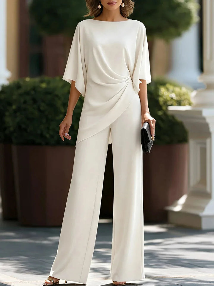 White two piece set with batwing sleeve top and wide leg pants, front view