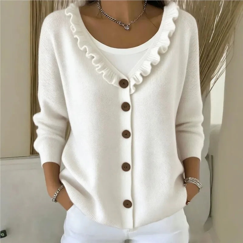 White ruffle V-neck button front cardigan on model