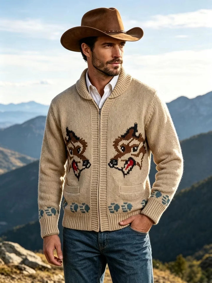 Man wearing tan fox graphic knit cardigan with cowboy hat outdoors