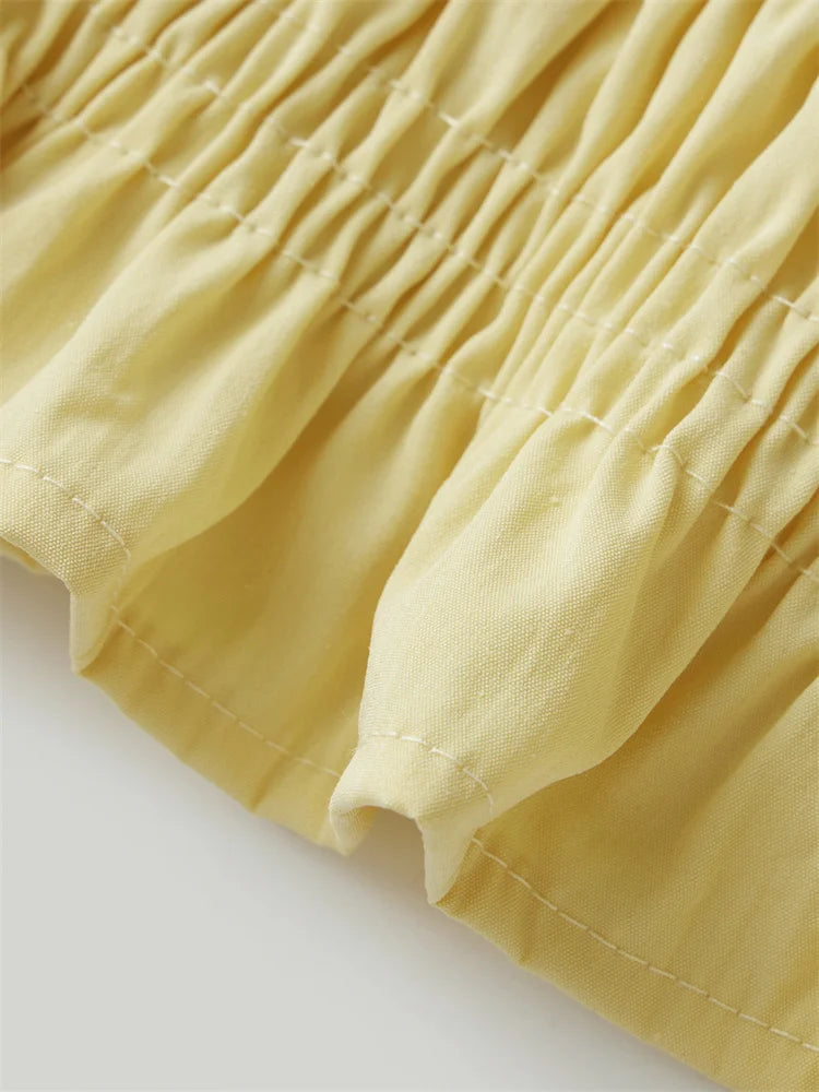 Abigail Ruffle Hem Sleeveless Top
