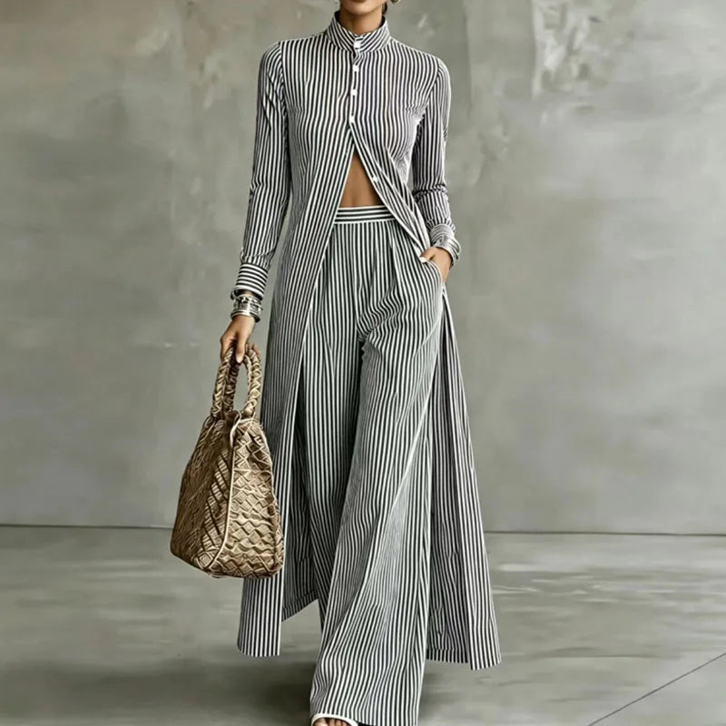 Woman wearing black and white striped two piece set with wide leg pants