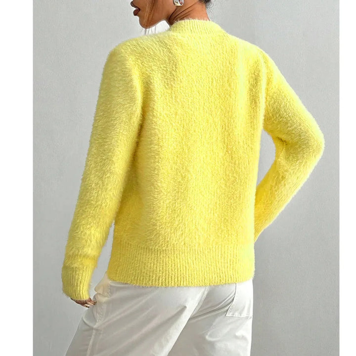 Back view of yellow fuzzy knit cardigan