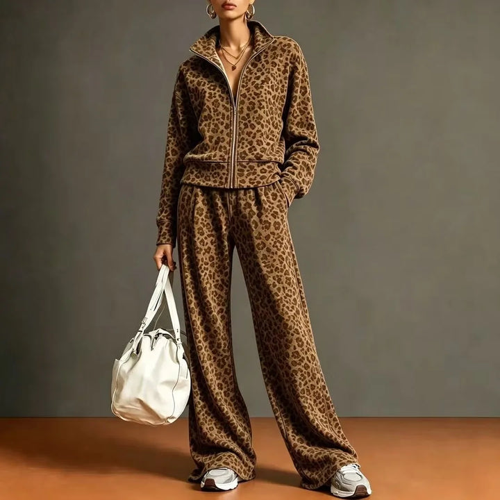 Woman wearing brown leopard print zip jacket and wide leg pants set